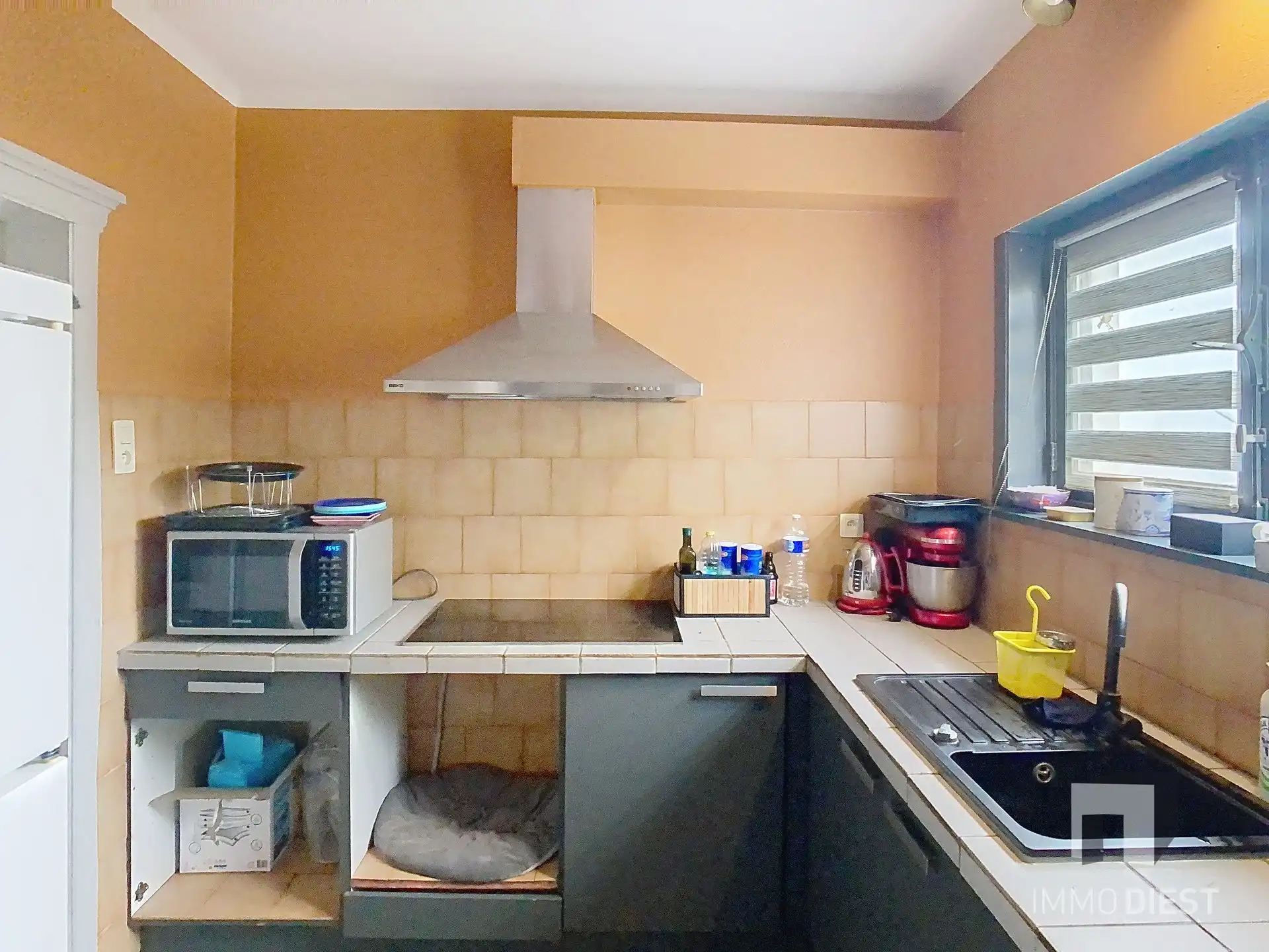 Charmante, op te frissen woning met ruime tuin nabij het centrum van Herselt. foto 9