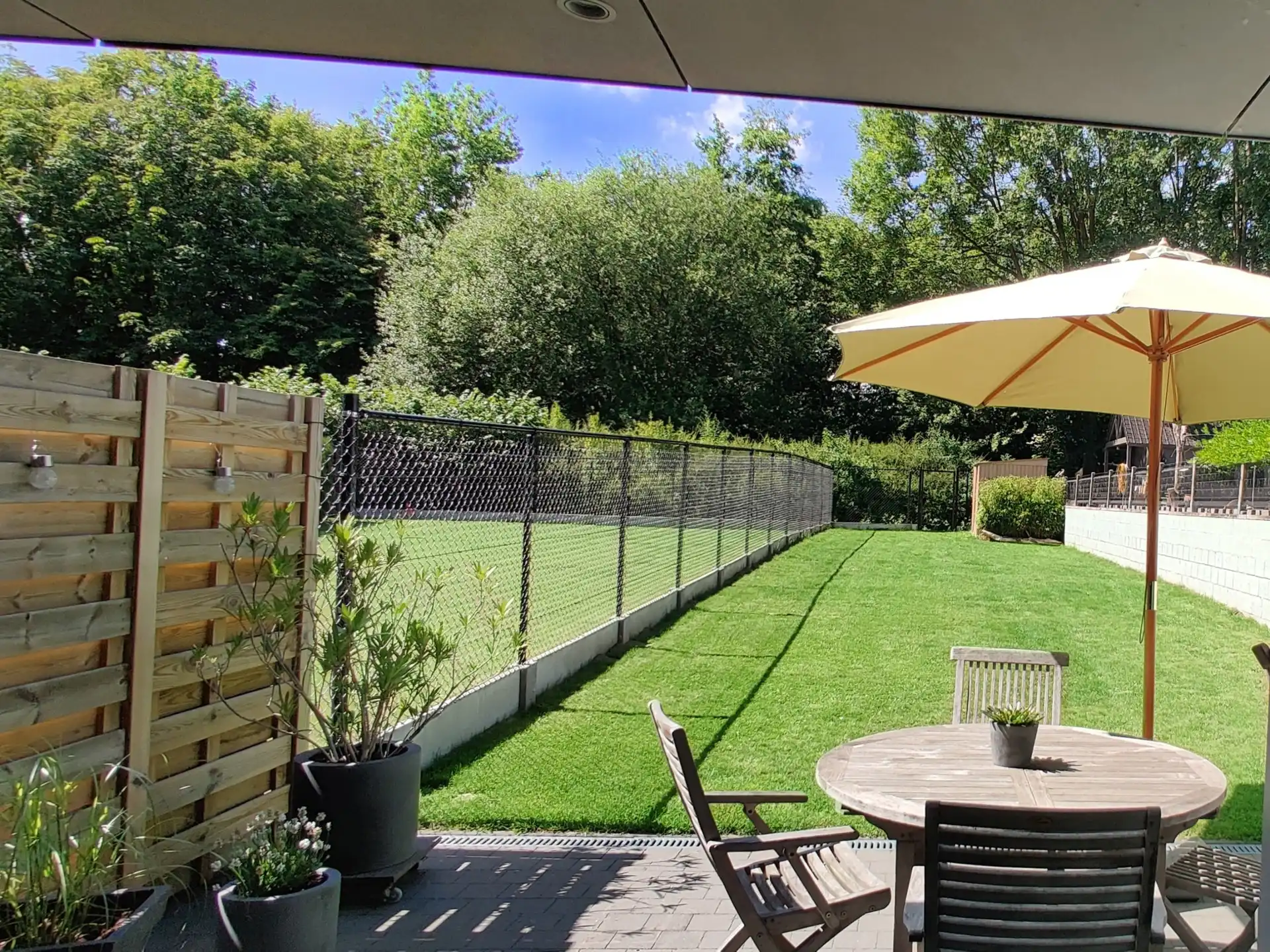 GIJZEGEM - Gelijkvloers appartement met tuin en staanplaats. foto 11