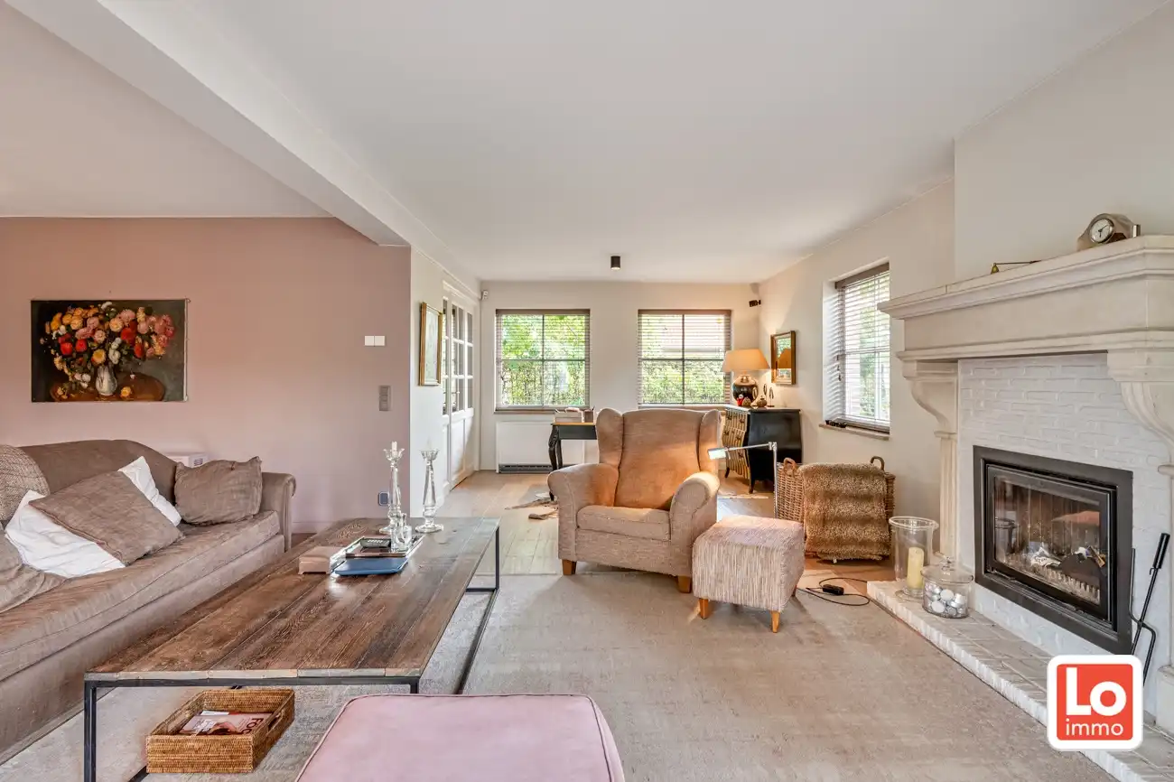 VERKOCHT! Charmante alleenstaande woning met inpandige garage en grote tuin op een rustige, groene locatie nabij het centrum van Beervelde! foto 8