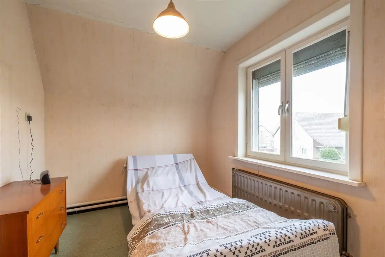 Vlakbij ingang merodebossen, soldie woning met potentieel foto 18