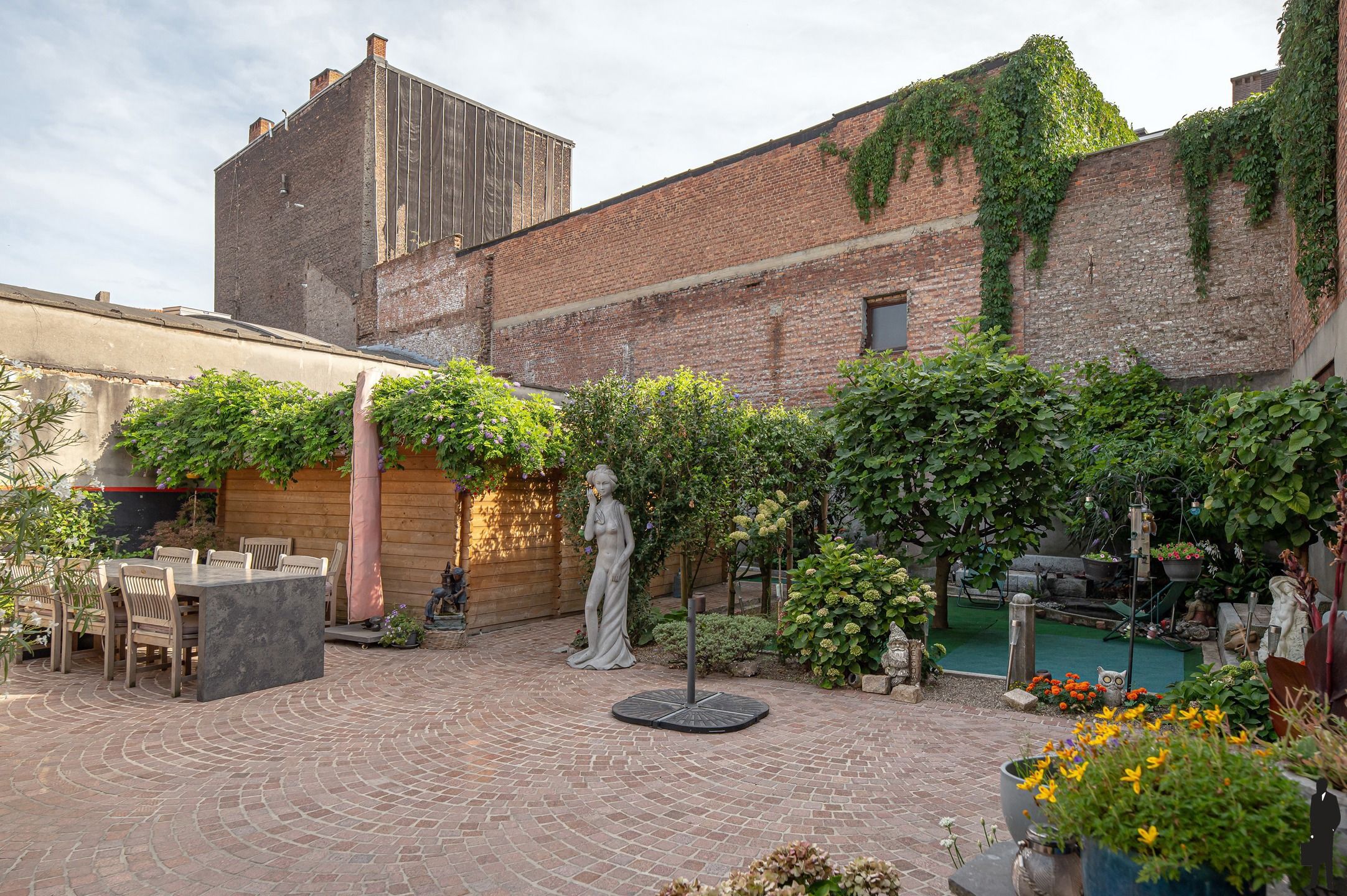 Exclusief gelijkvloers appartement met hoogwaardige afwerking en unieke stadstuin (230m²) foto 35