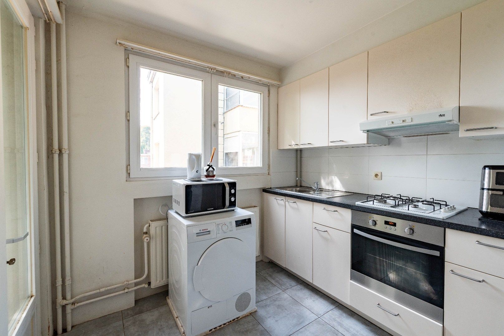 Gerenoveerd appartement met 2 slaapkamers en zonnig terrasje foto 6