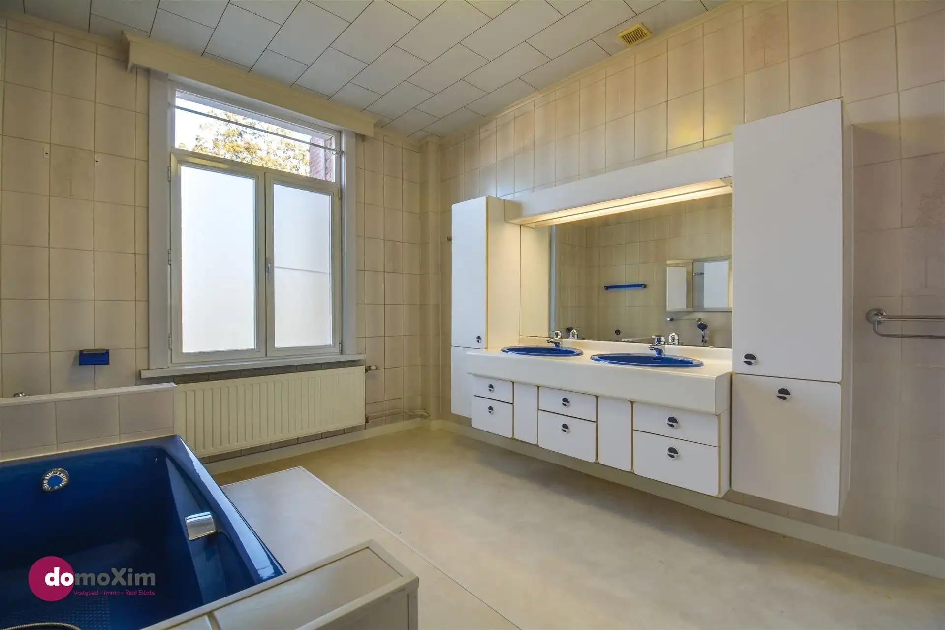 Ruime, karaktervolle stadswoning met twee garageboxen en tuin in Mechelen foto 18