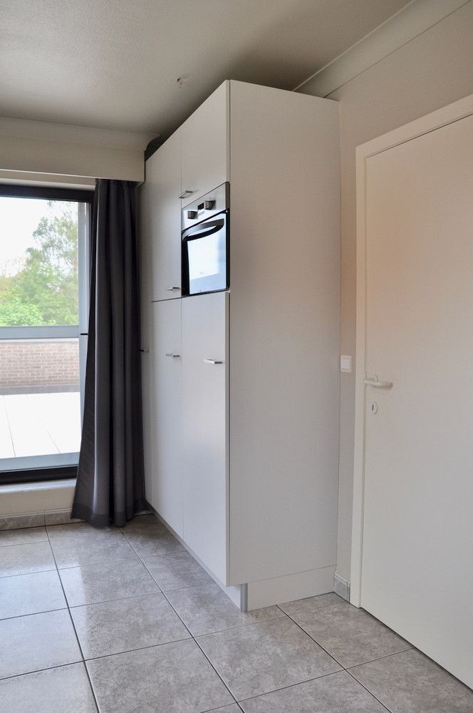 Ruim en licht duplex app met 4 slk, groot terras en garagebox foto 5