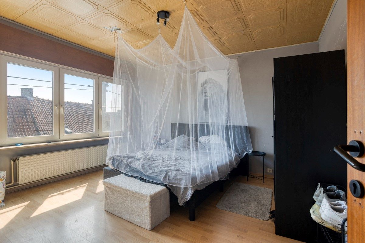 Te renoveren woning met naastliggend bouwperceel! foto 9