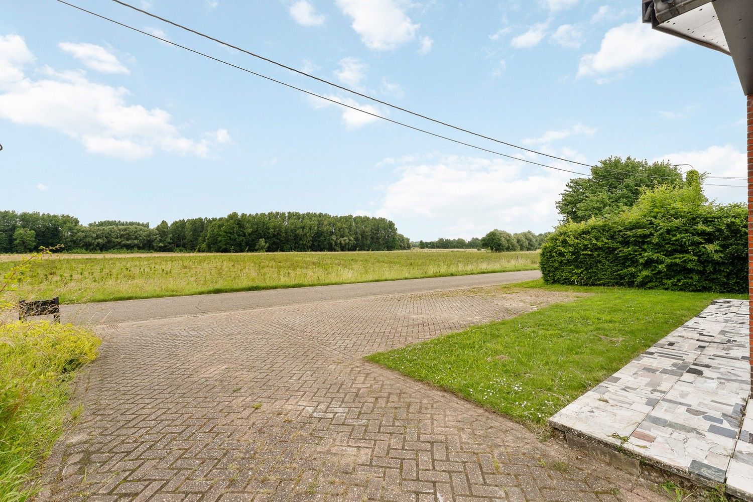 Charmante woning met 3 slpkrs en loods op een perceel van 726 m² foto 2