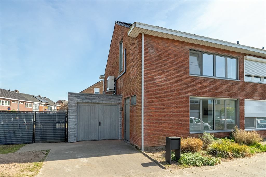 Instapklare woning met garage en gezellige tuin foto 23
