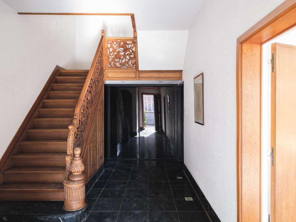 Voormalige dokterswoning met praktijkruimte en stadstuin foto 7