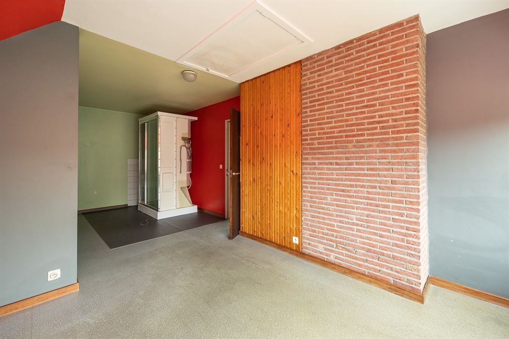 Unieke jaren 80-woning met ruime tuin foto 19