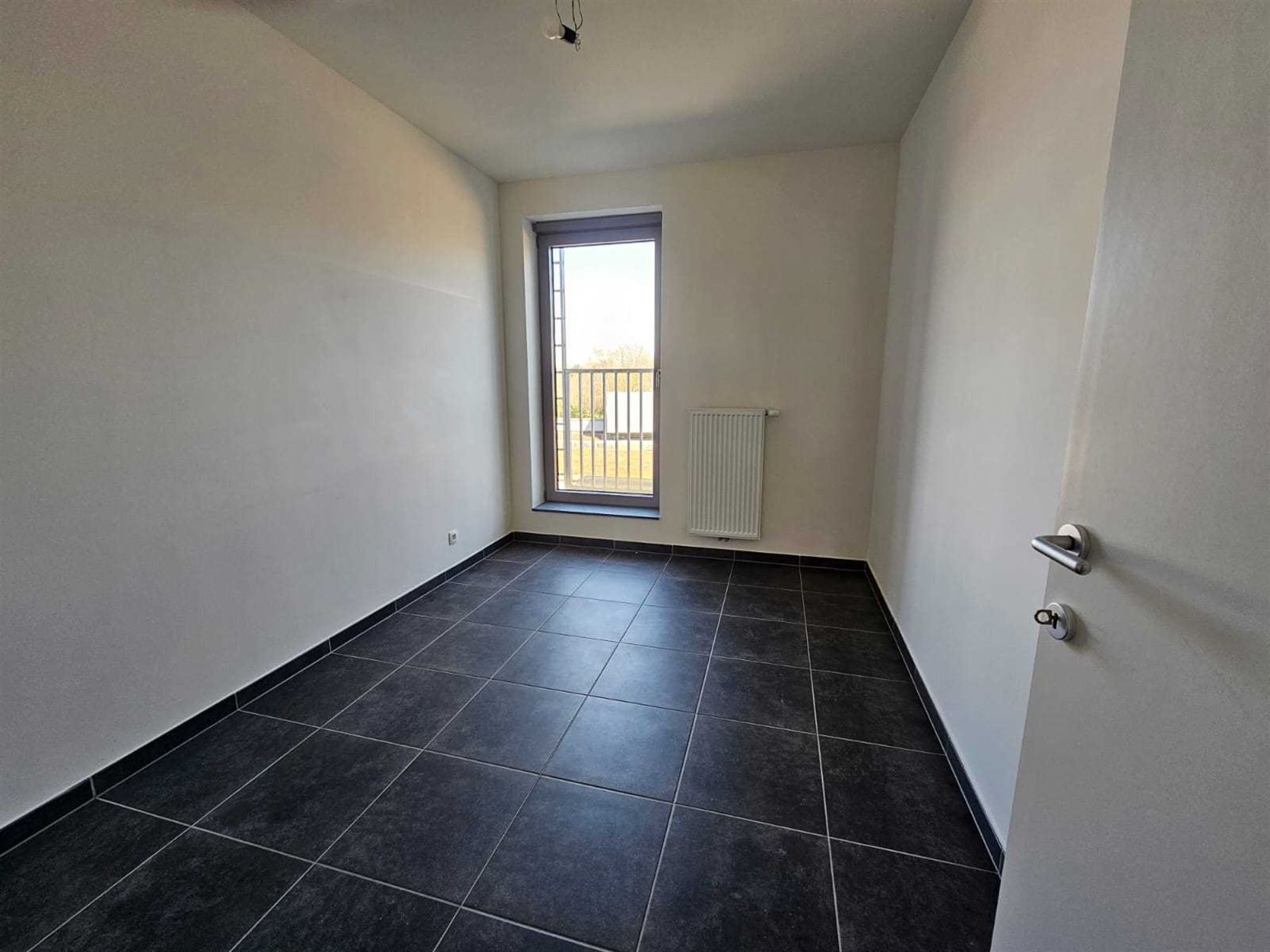 Ruim (104 m² bruto) en licht appartement met 2 slaapkamers! foto 10