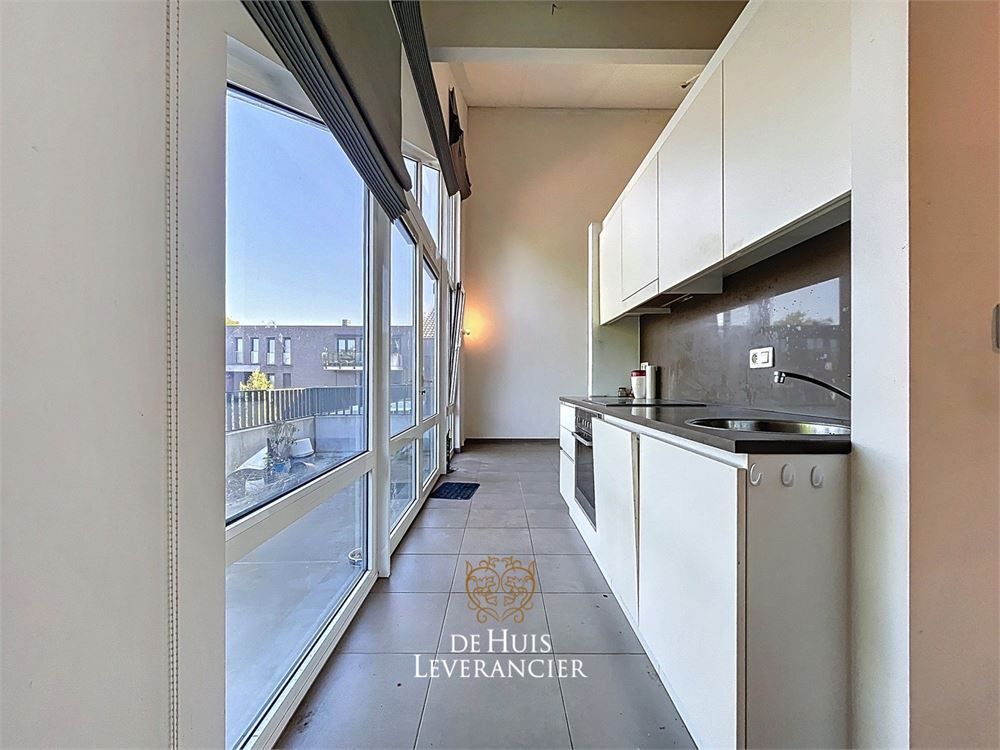 Luxueuze serviceflat met 1 slk en ruim terras foto 10