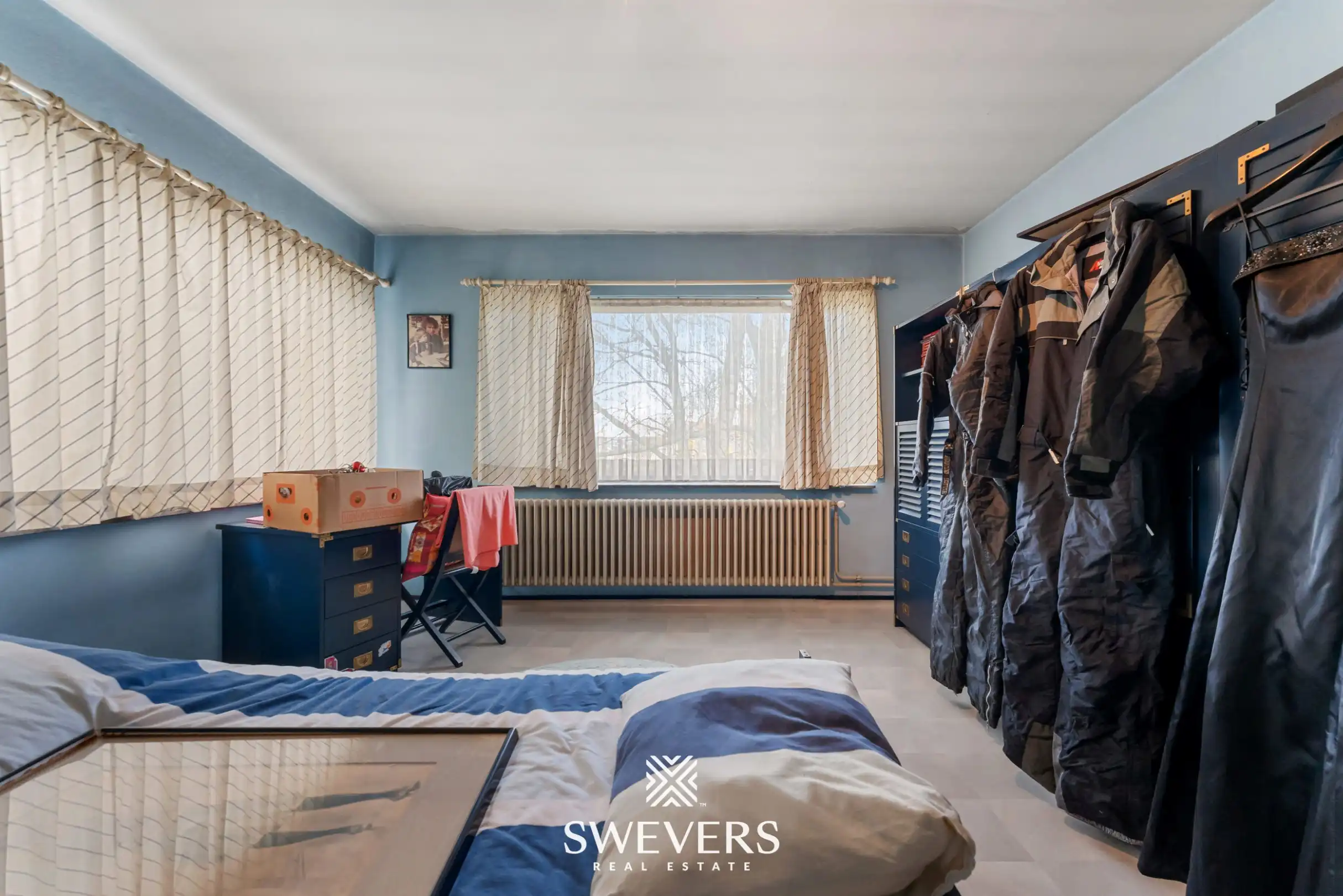 Ruime halfopen bebouwing met 4 slaapkamers en veel renovatiepotentieel op topligging in Hasselt foto 16