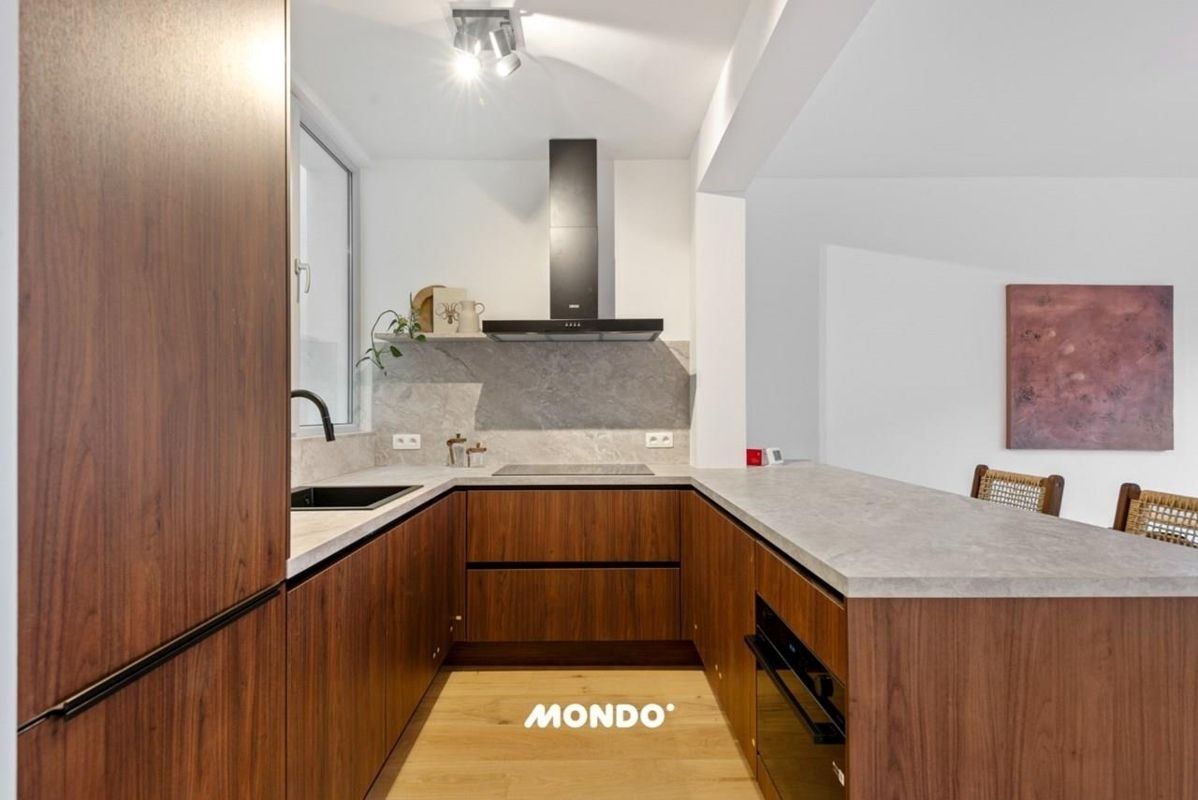 Instapklaar compleet gerenoveerd appartement met tuin EPC B foto 3