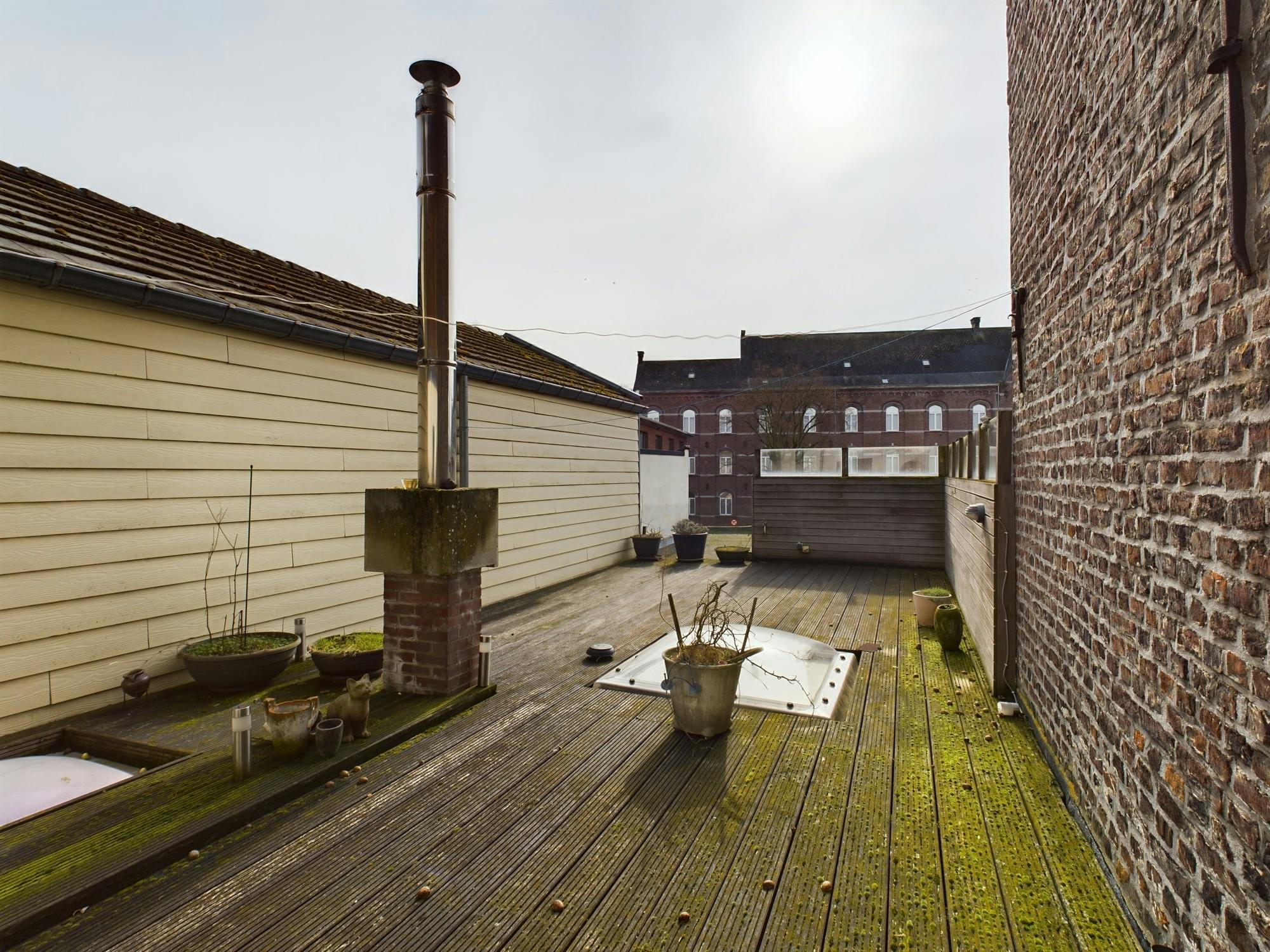 Goed draaiende dagbladhandel op de winkelstraat van Maaseik te koop foto 9