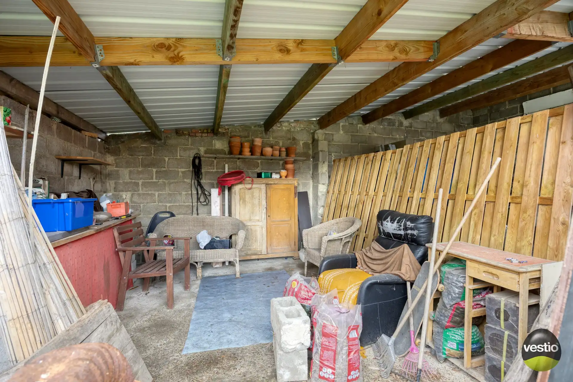 Te renoveren woning met bijgebouwen in het rustige centrum van Bevingen (Sint-Truiden) foto 8