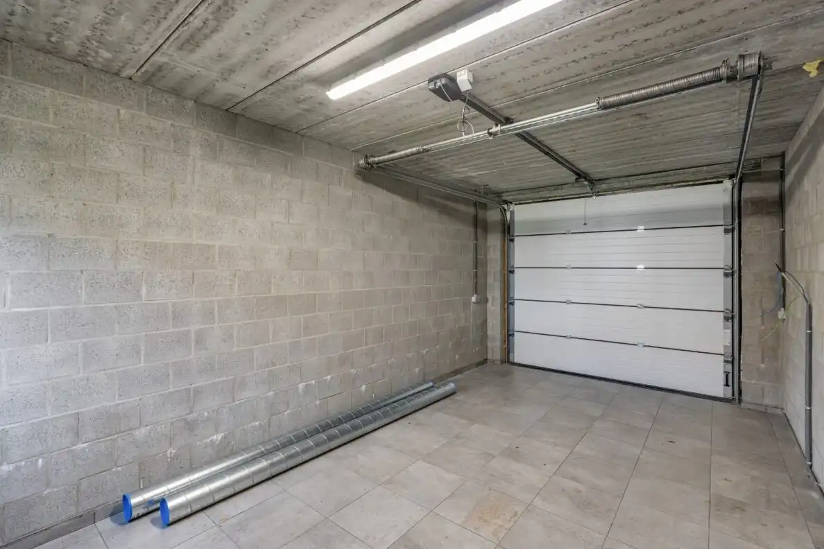 TE KOOP – Ruim nieuwbouw gelijkvloers appartement met tuin en garage in het centrum van Helchteren foto 15