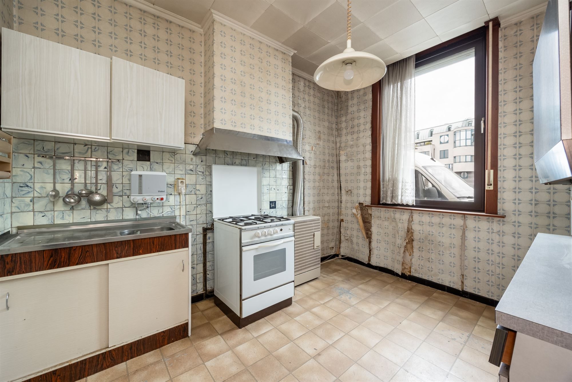 Te renoveren woning met tuin op toplocatie in Mechelen foto 9