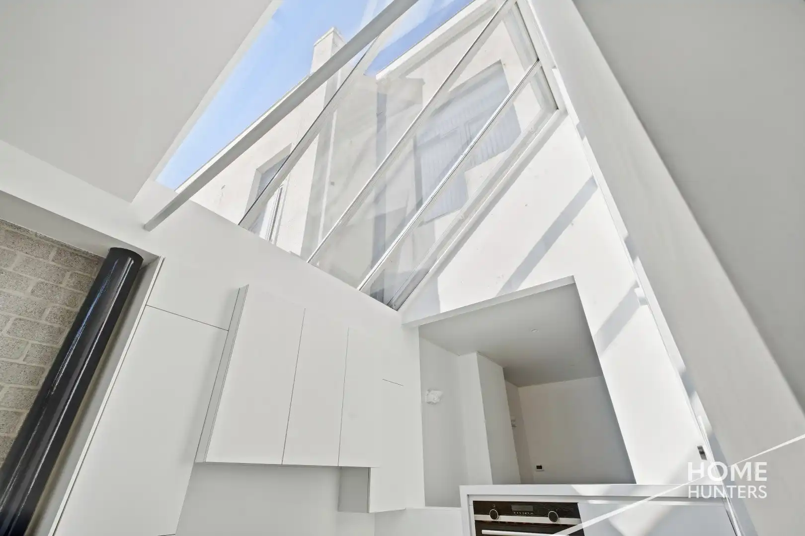 Ruime instapklare stadswoning met 3 slpks, tuin en EPC B foto 11