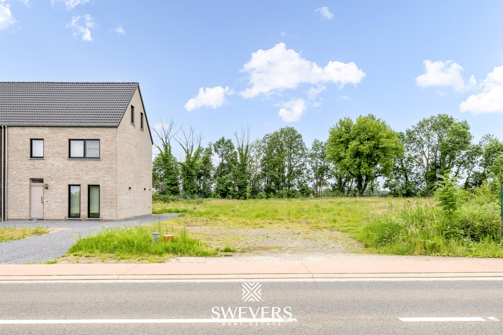 Zuidelijk georiënteerde bouwgrond van 5a in Bilzen foto 11