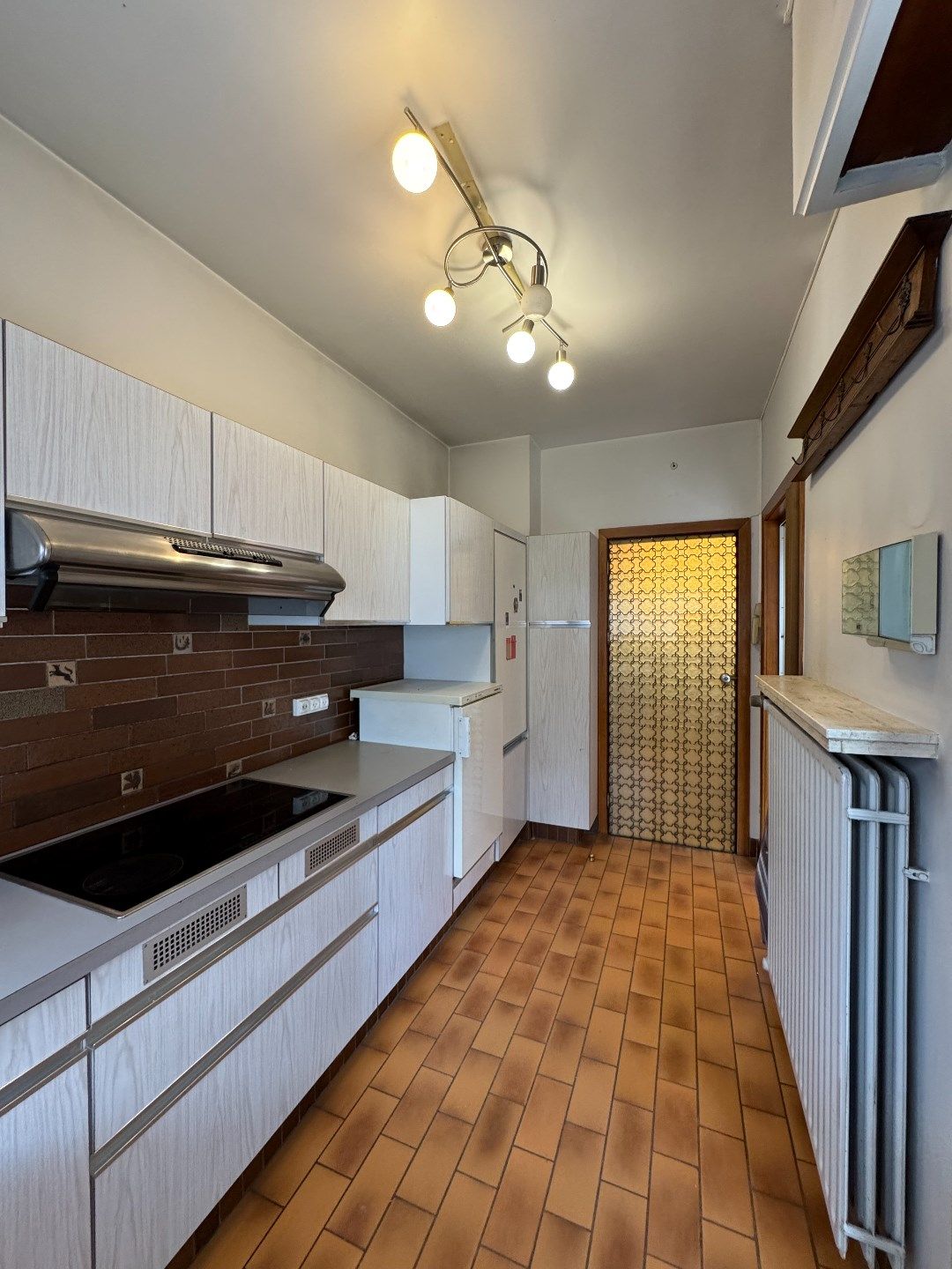 Bel-etagewoning met potentieel en stadstuin in hartje Vilvoorde foto 9