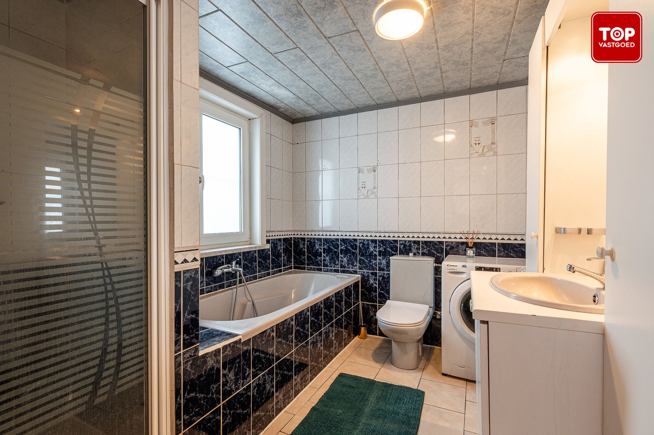 Charmante woning nabij het centrum van Drongen foto 10