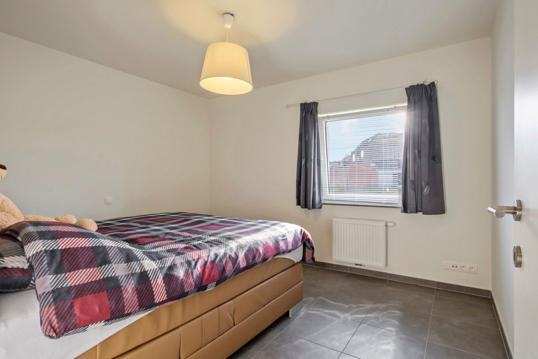 Lichtrijk gelijkvloers appartement in centrum Loppem foto 6