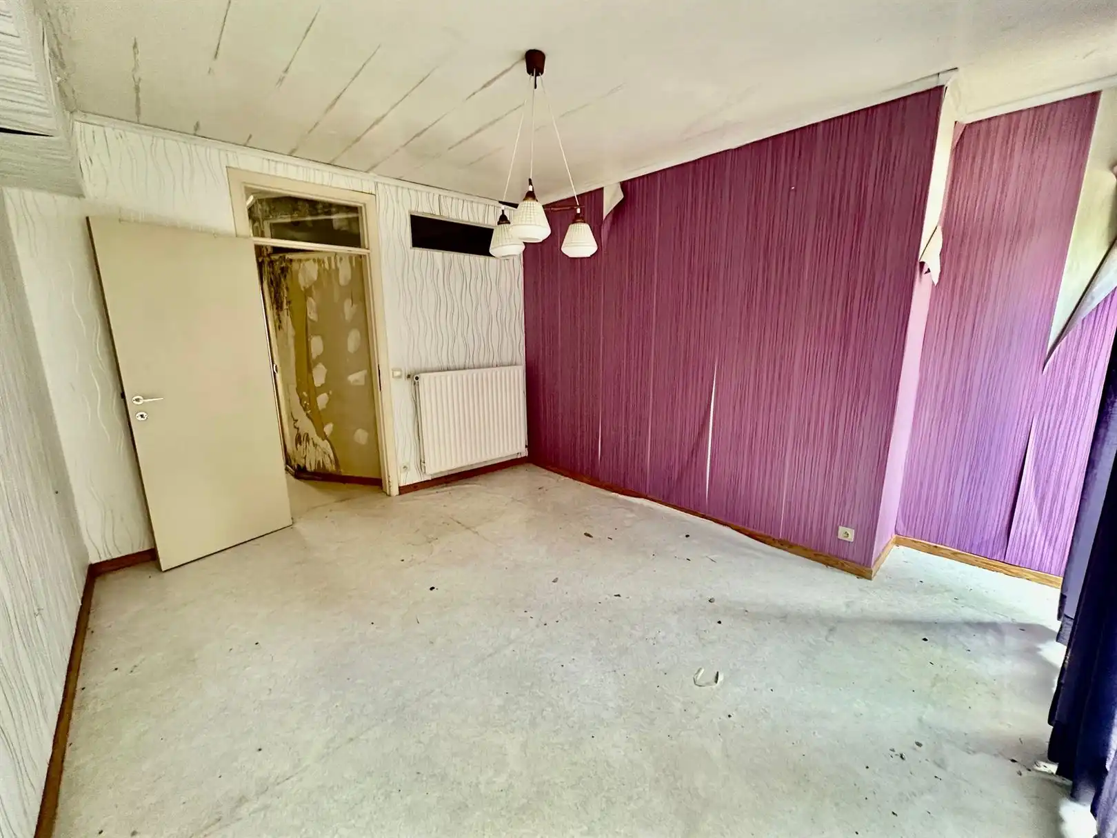 Te renoveren woning met garage foto 4