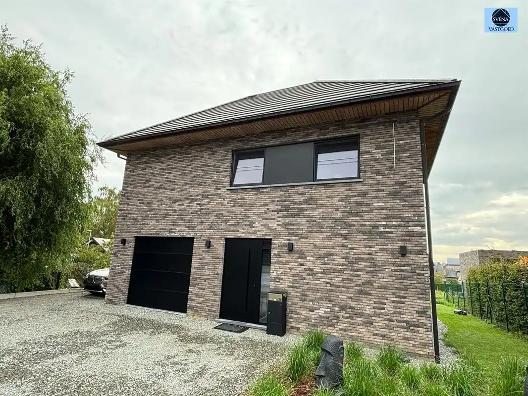 LUXUEUZE RECENTE WONING MET 3 SLAAPKAMERS, GARAGE EN TUIN foto {{pictureIndex}}