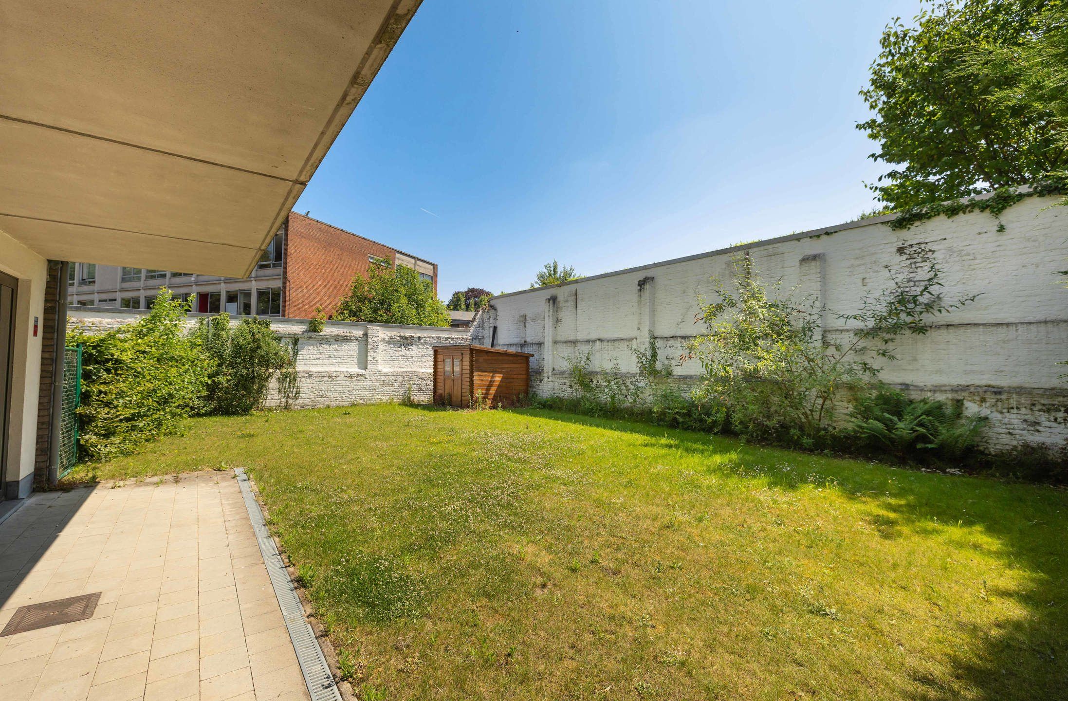 Appartement 3 slaapkamers ± 130 m² + tuin ± 200 m² + parkeerplaats foto 5