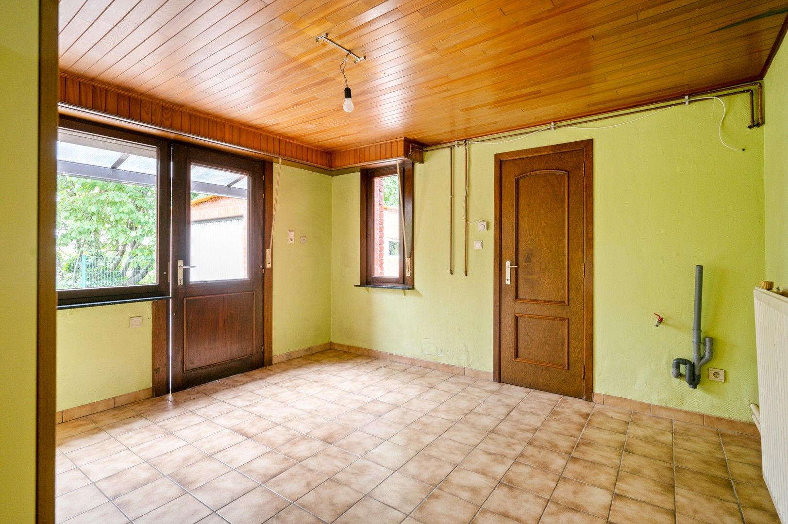 Te renoveren woning met tuin en garage in Wolfsdonk! foto 11