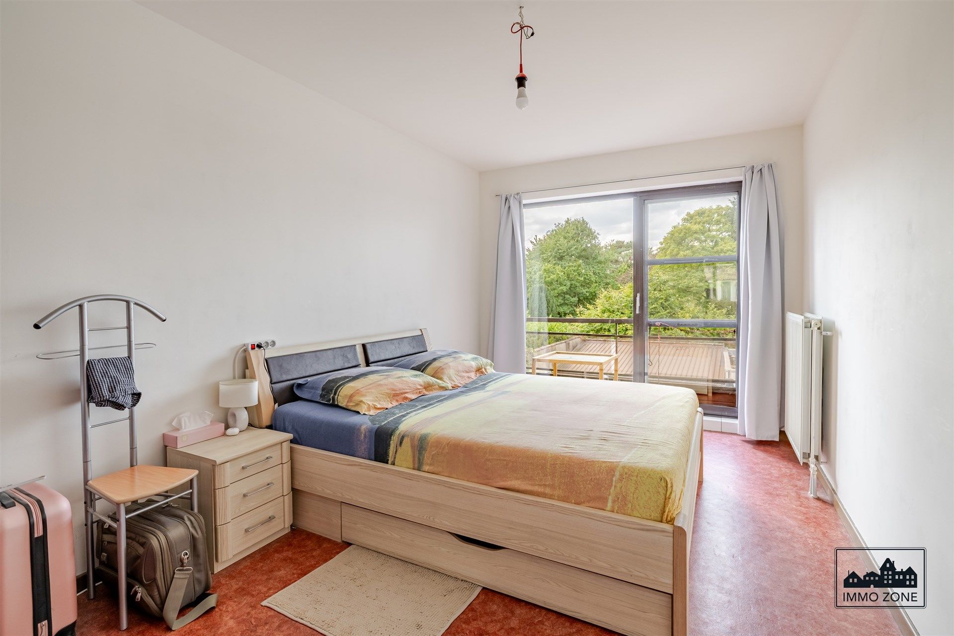 Ruim éénslaapkamerappartement te koop met terras en garage foto 8