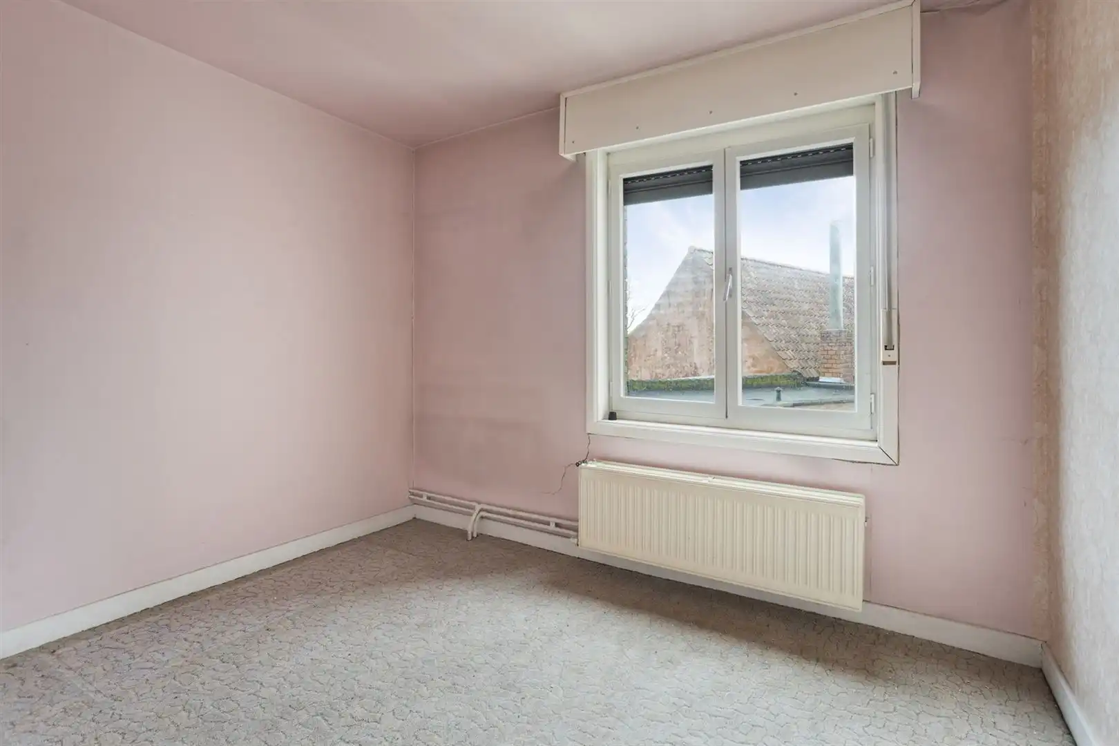 Te renoveren woning gelegen aan het plein in Kaprijke ! foto 13