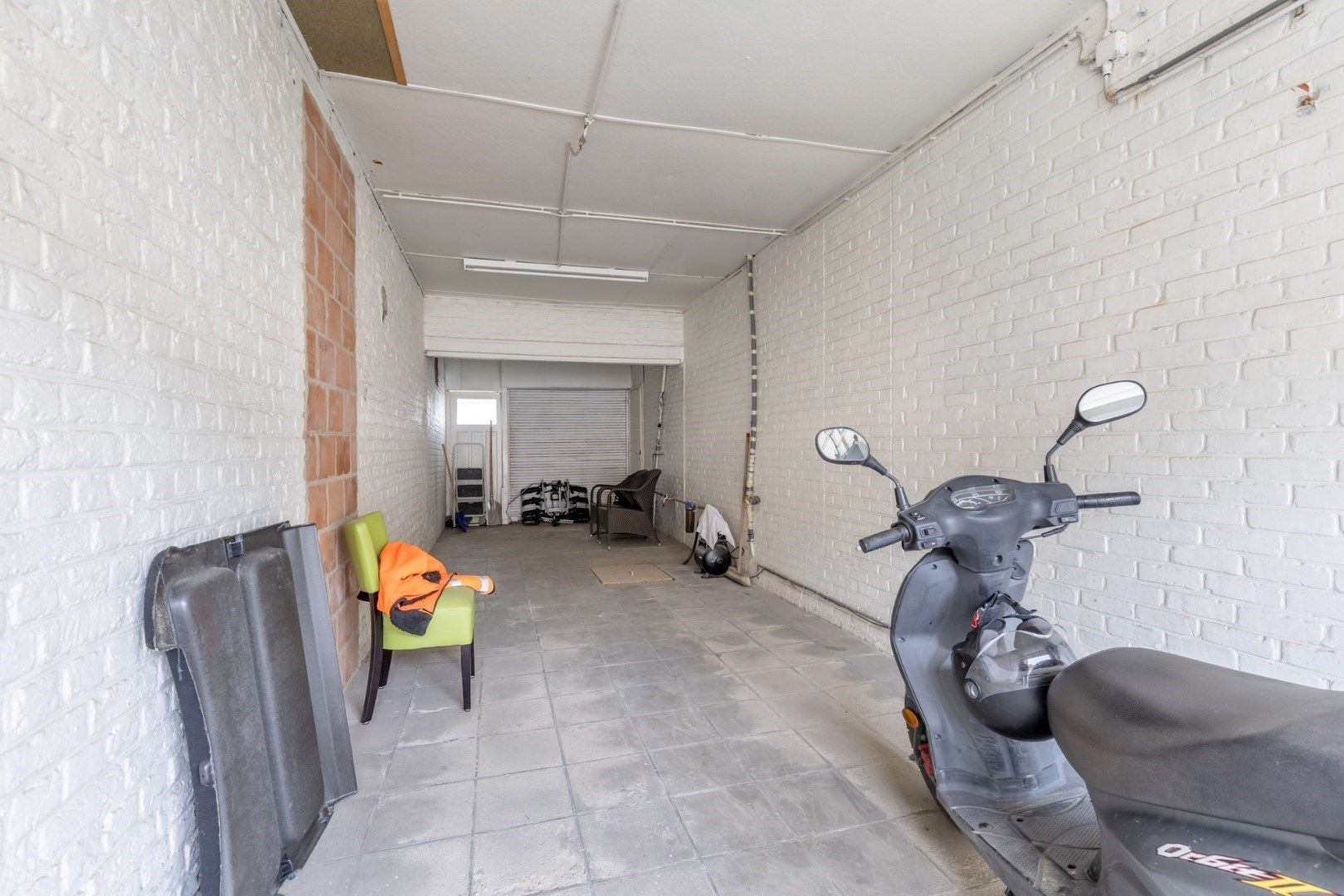 Ruime woning met 4 slaapkamers, garage en diepe tuin met inrit foto 23