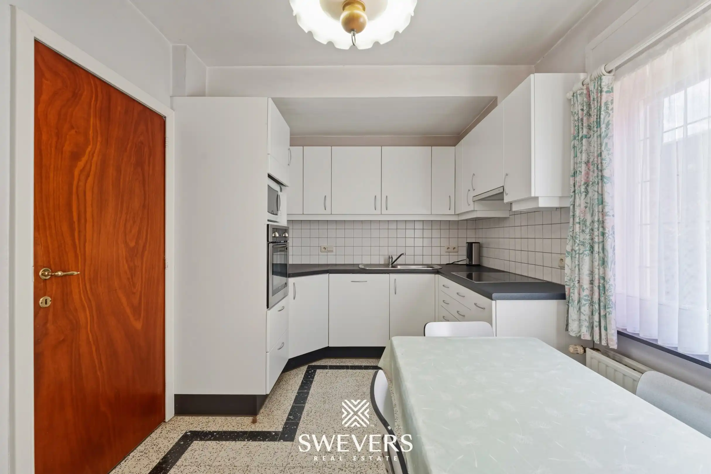 Vrijstaande woning met drie slaapkamers, bureauruimte en tuin in Houthalen foto 11