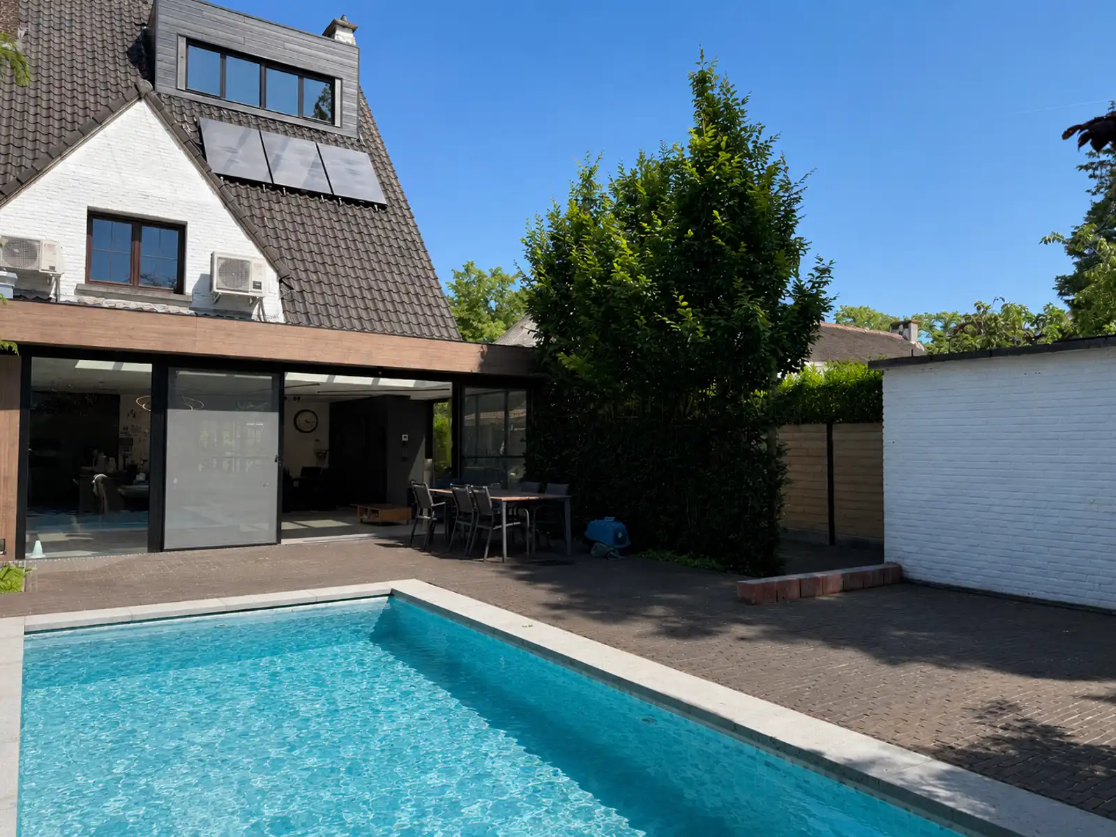 Ruime halfopen villa met zwembad in Elsdonkwijk foto 3