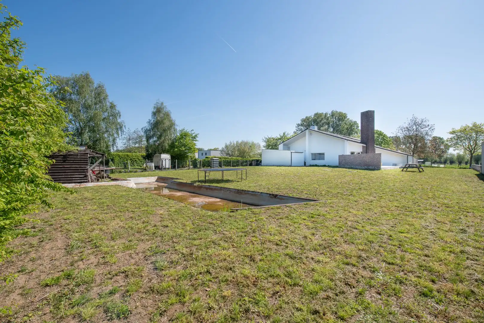 TE KOOP: Ruime architectenwoning in residentiële wijk 'De Piste'. Rustig, groen en zeer bereikbaar op een perceel van maar liefst 1800m²!  foto 17