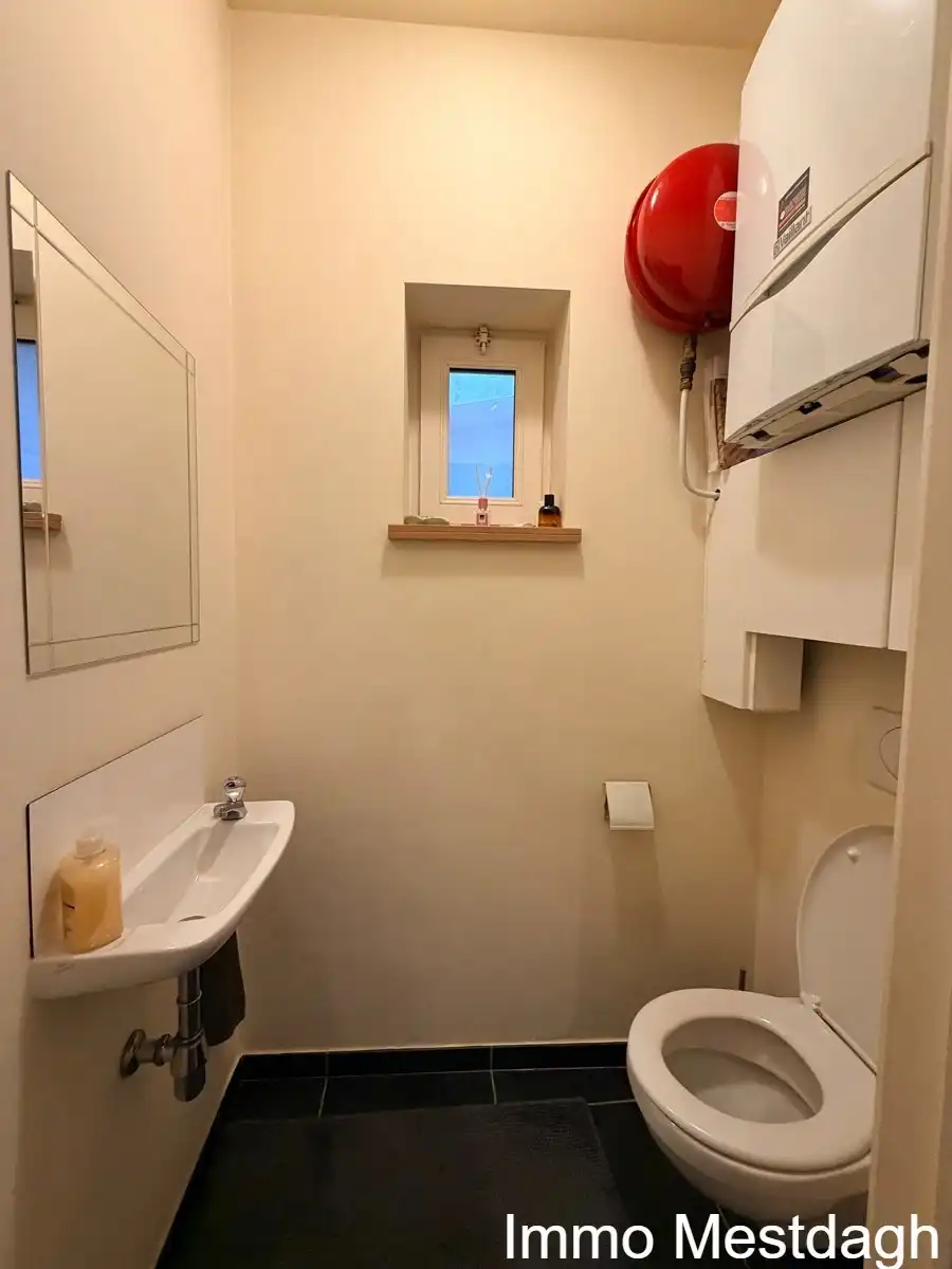 Ruim en energiezuinig gelijkvloers appartement (115 m²) met terras en staanplaats in hartje Diest foto 14