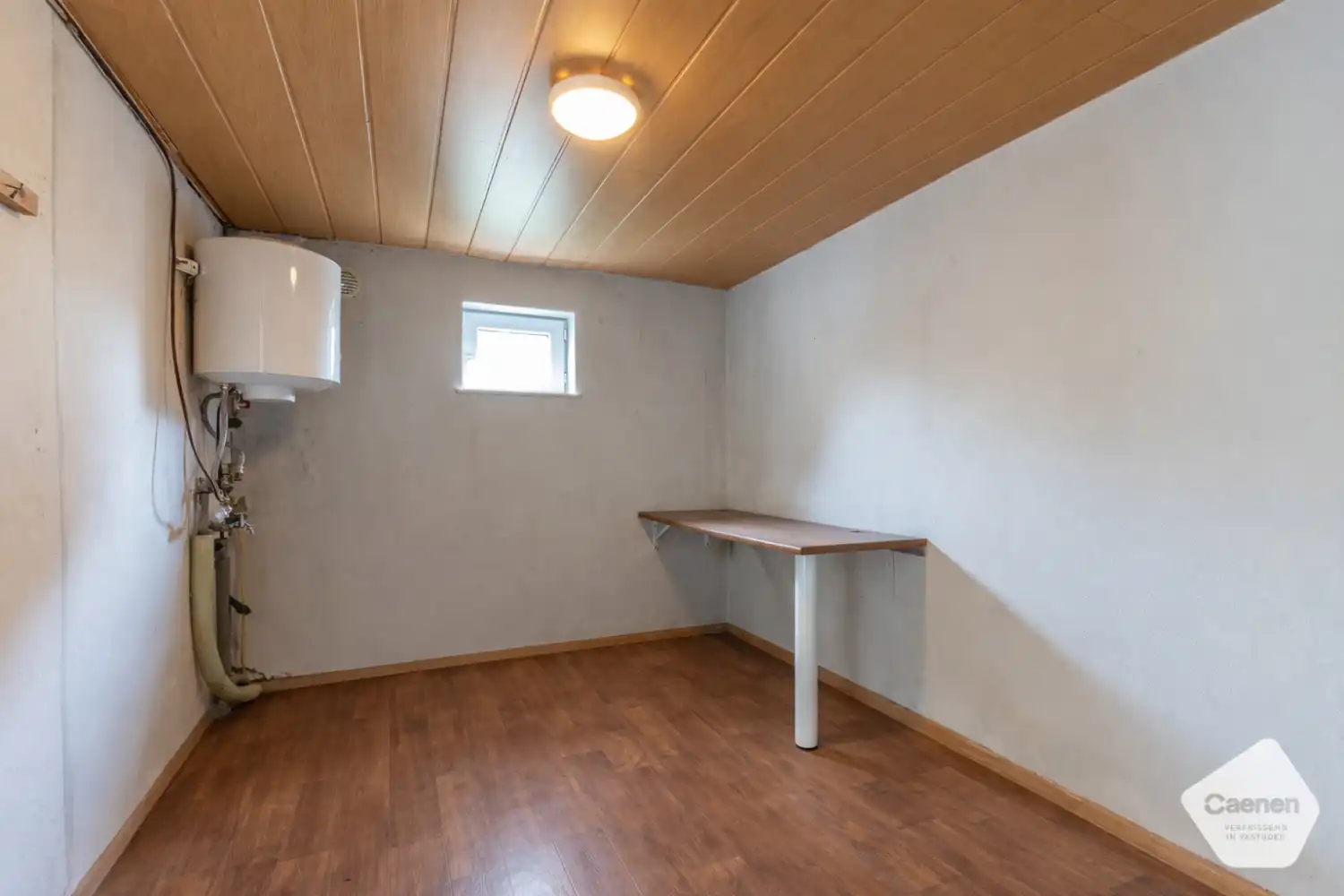 Charmante halfopen woning met tuin en garage in het centrum van Ruddervoorde. foto 6