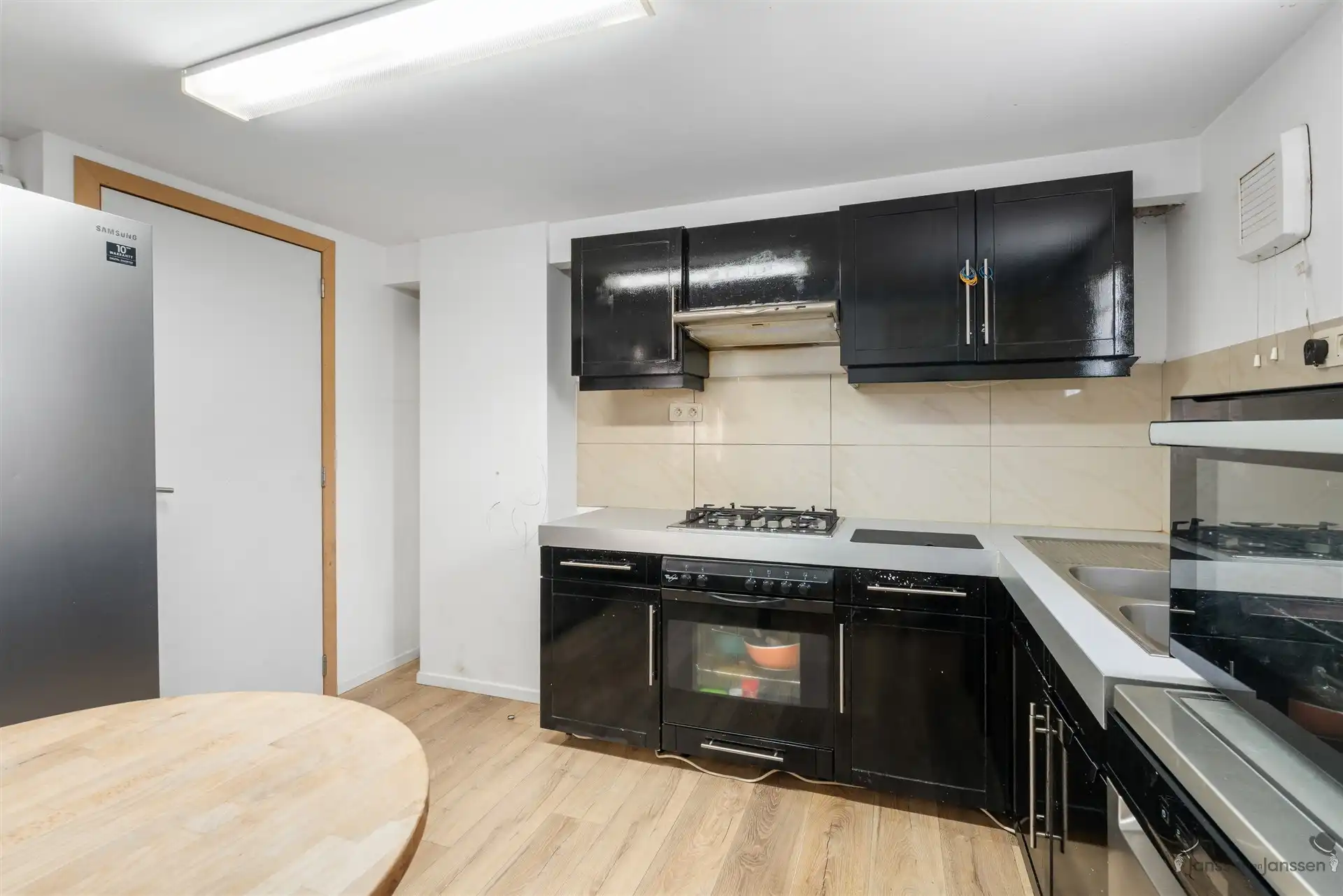 Vrijstaande woning met modern bijgebouw en renovatiepotentieel in groen Beverlo foto 7