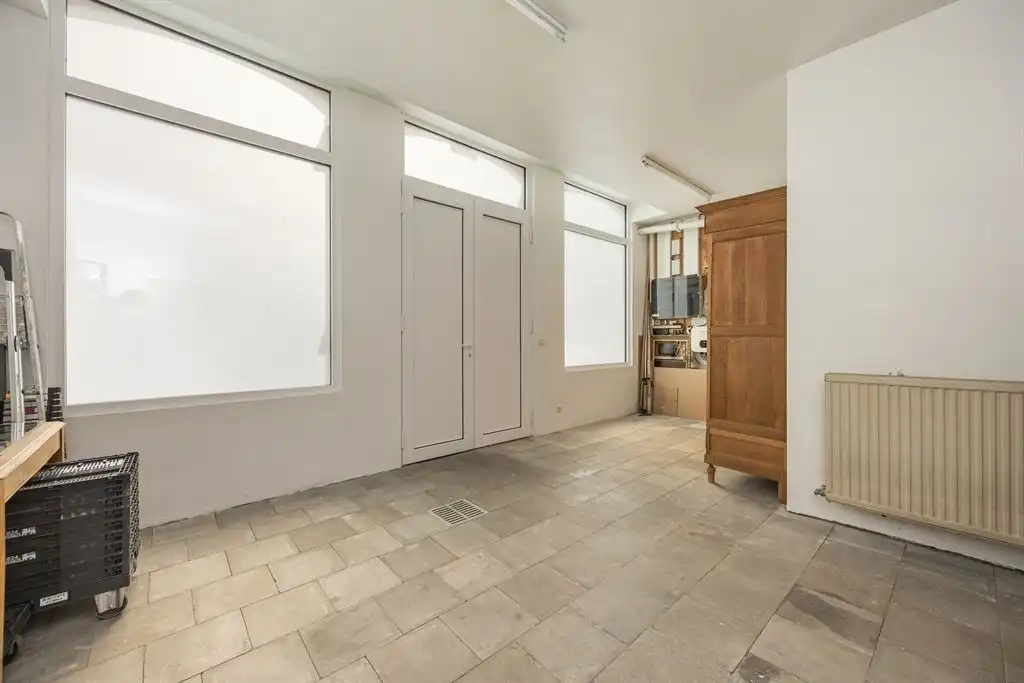 Unieke woning met eclectische gevels en dakterras foto 39