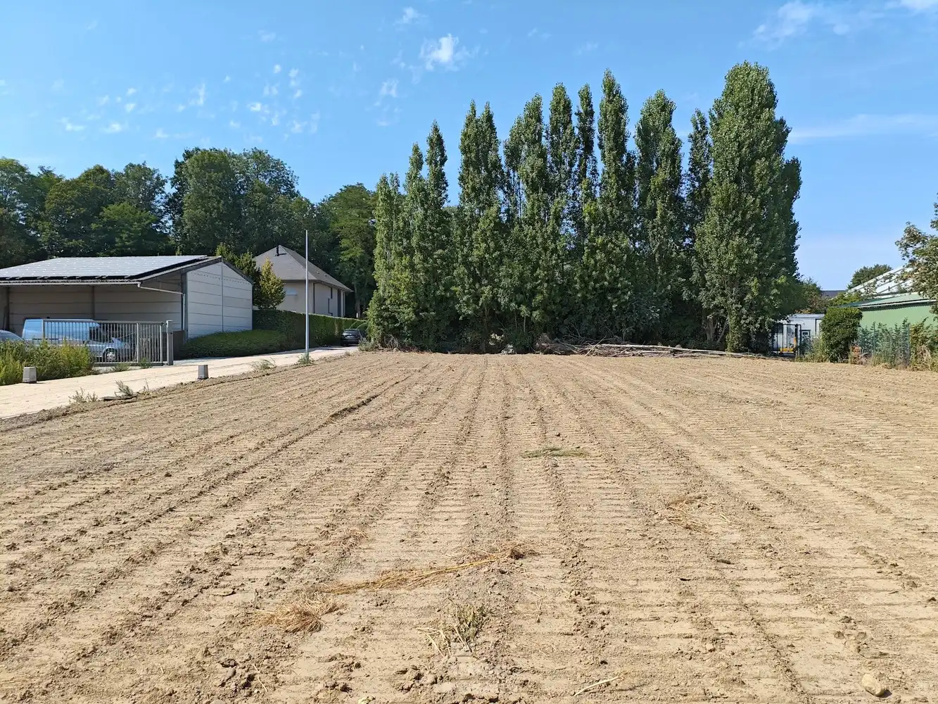 Perceel bouwgrond halfopen bebouwing Pittem foto 4