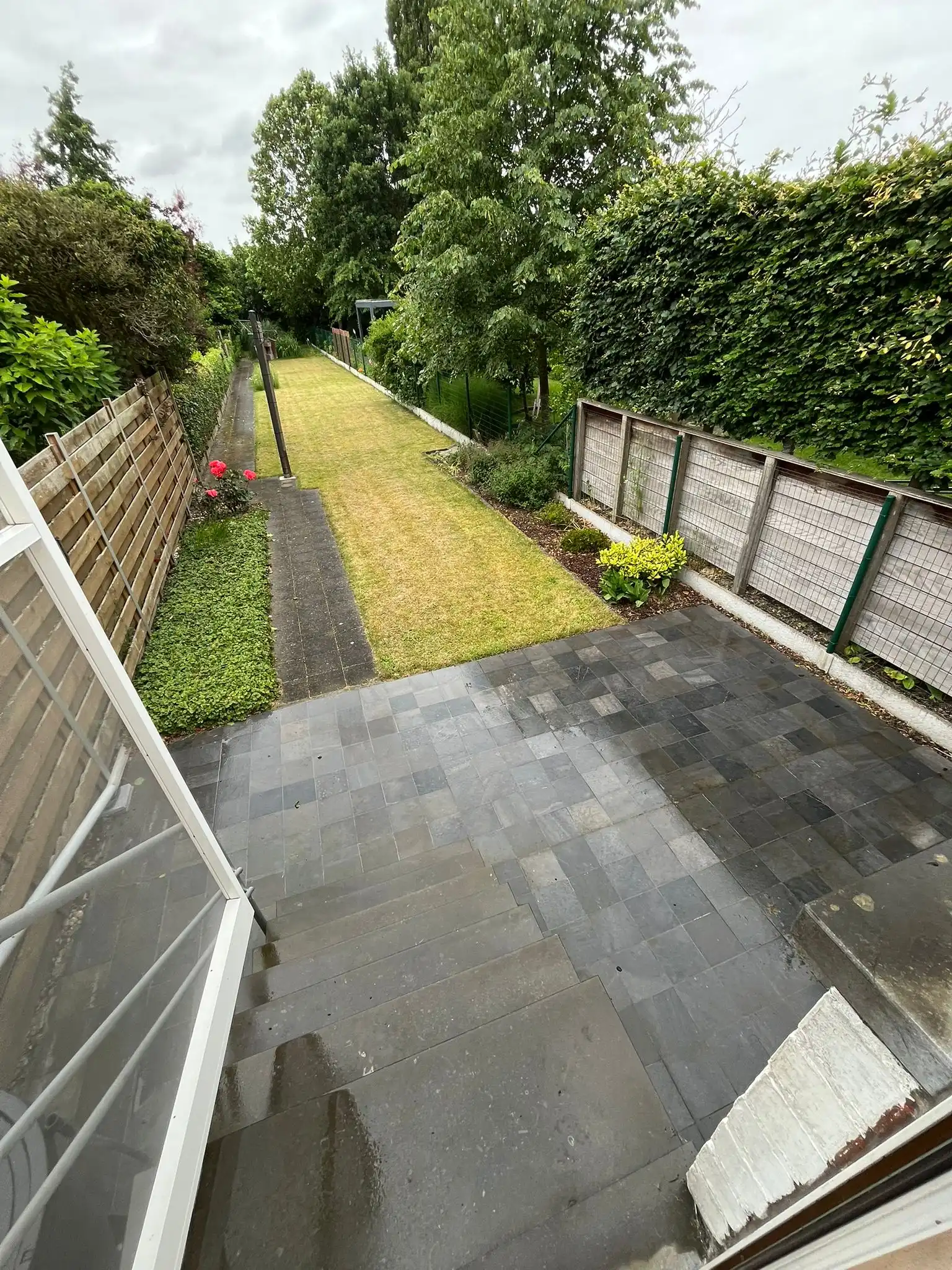 Stadswoning met tuin en parkeerplaats foto 7