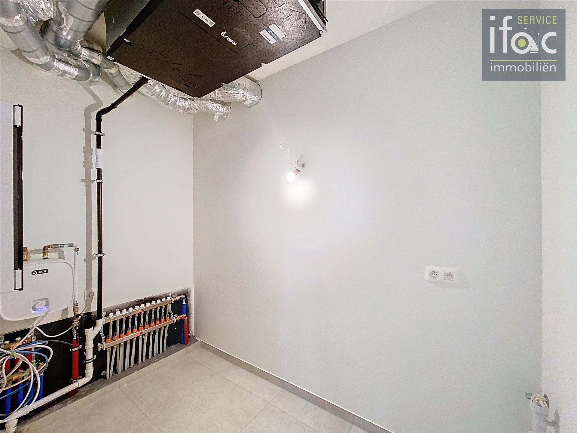 Nieuwbouw appartement met terras en ondergrondse staanplaats foto 14