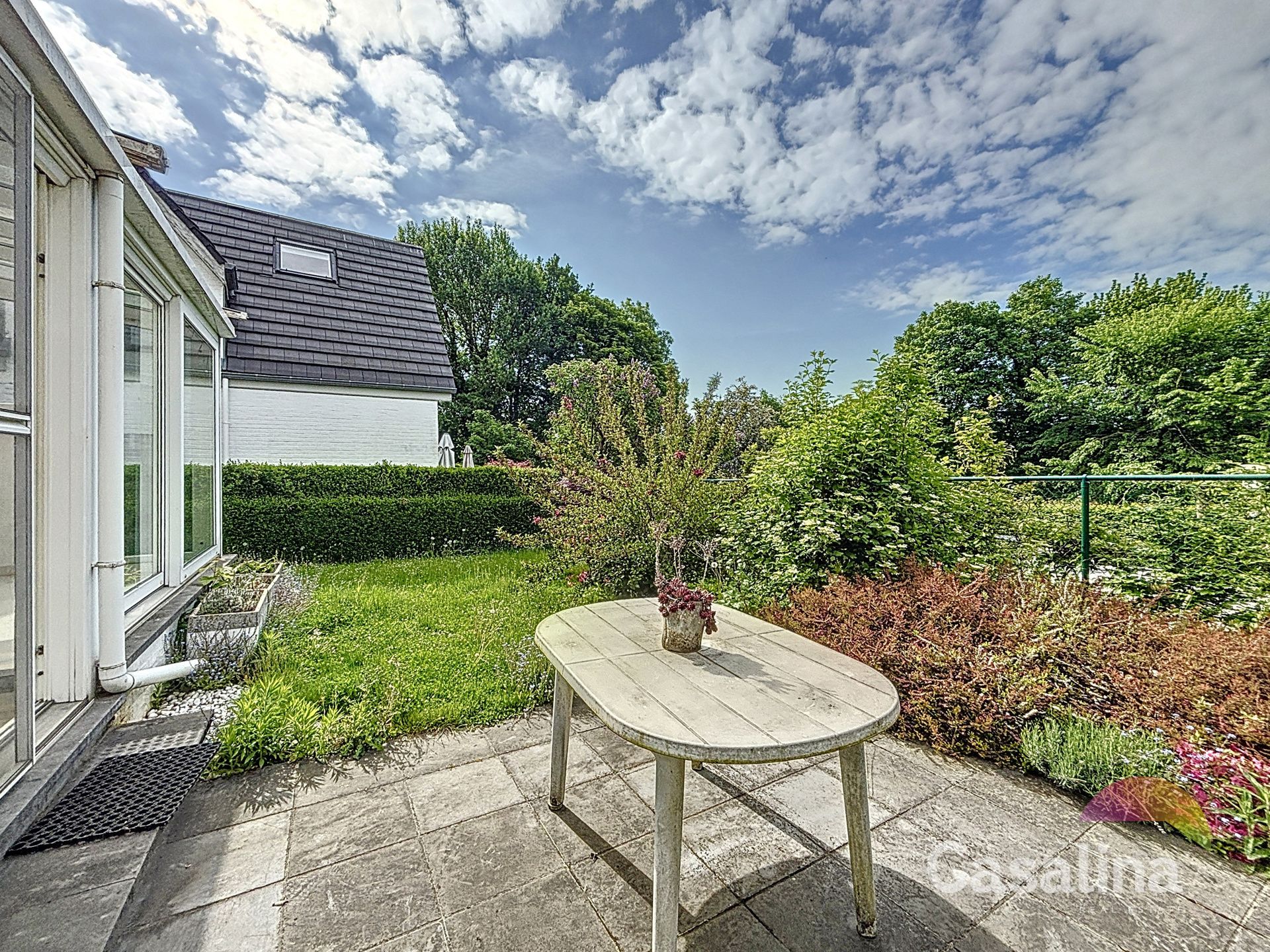 Vier gevel woning met tuin te huur  foto 3