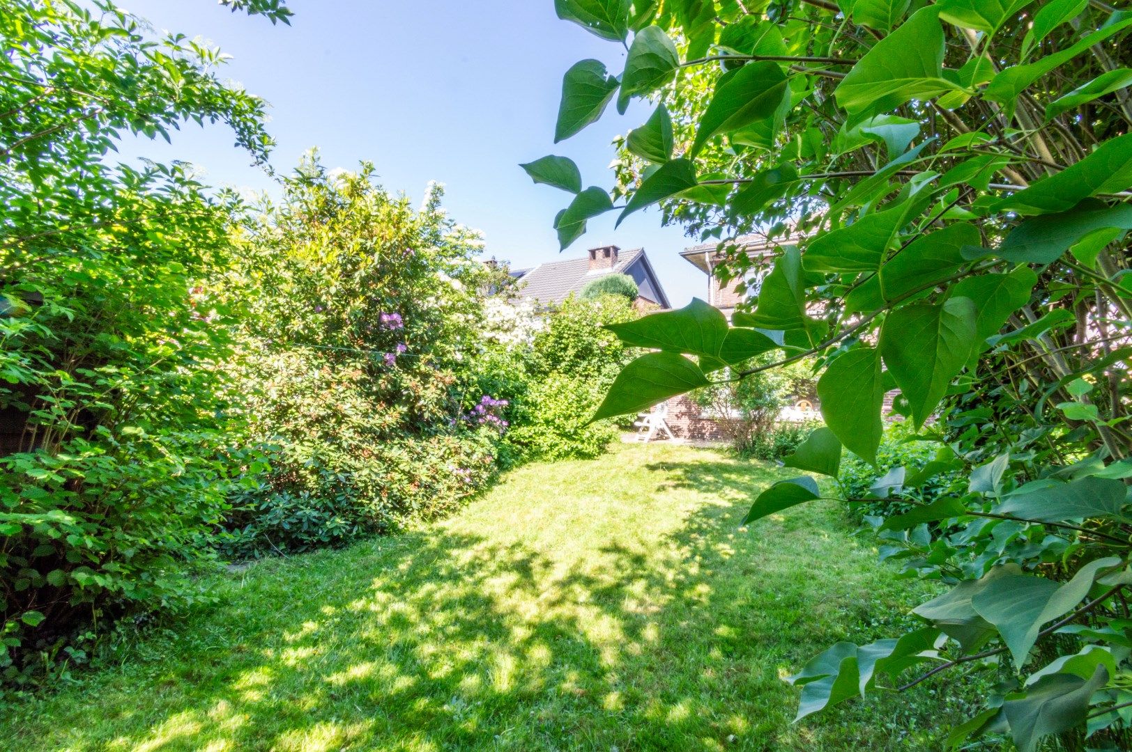 RUIME WONING MET 4 SLAAPKAMERS, GARAGE & ZUID-TUIN ! foto 4