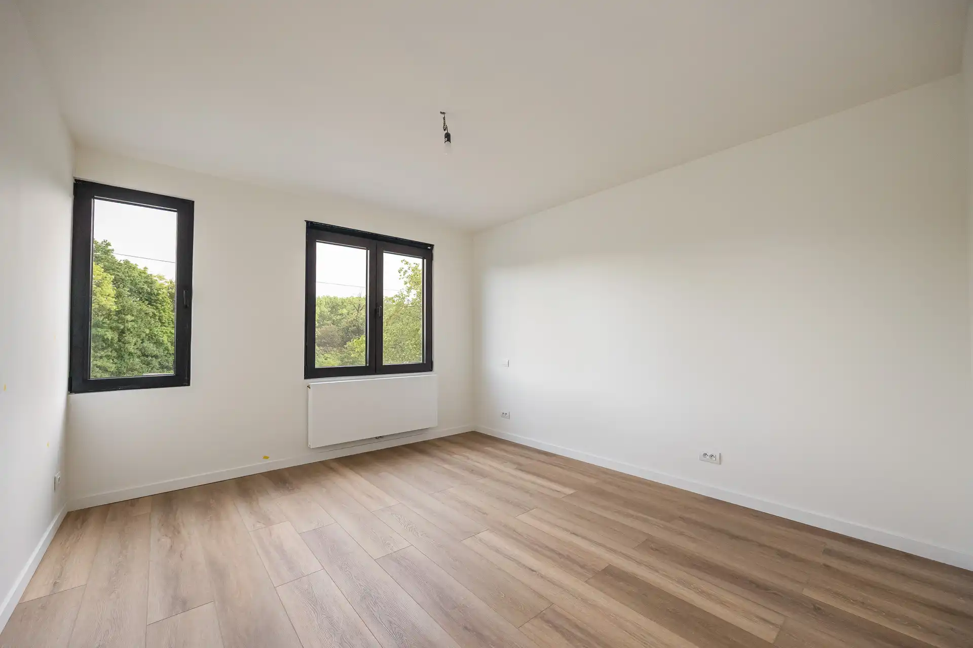 Ruim kwalitatief gerenoveerd 2 slpkappartement met ZW-terras foto 12