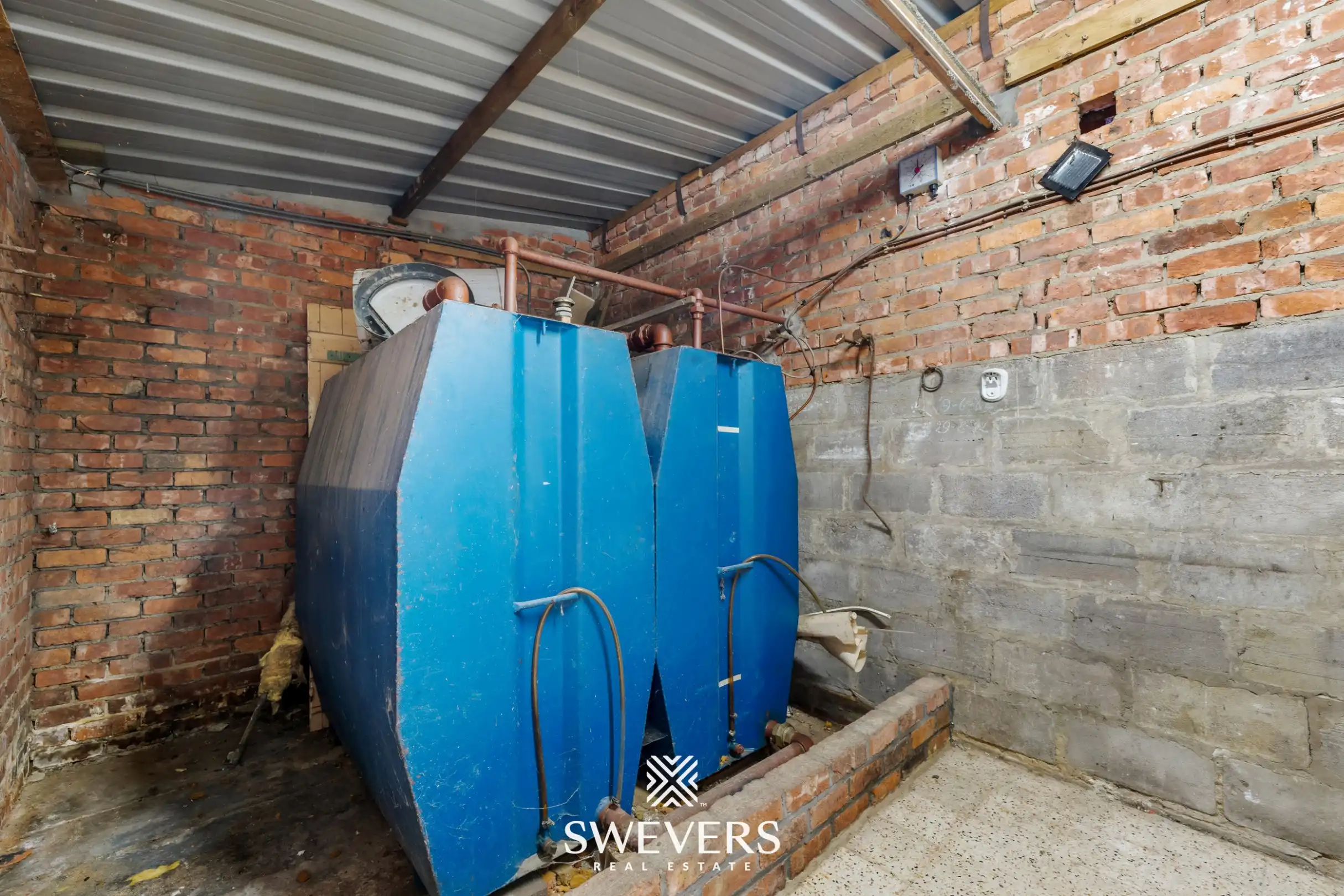 Te renoveren woning met 4 slaapkamers en 4 garages te Beringen foto 21