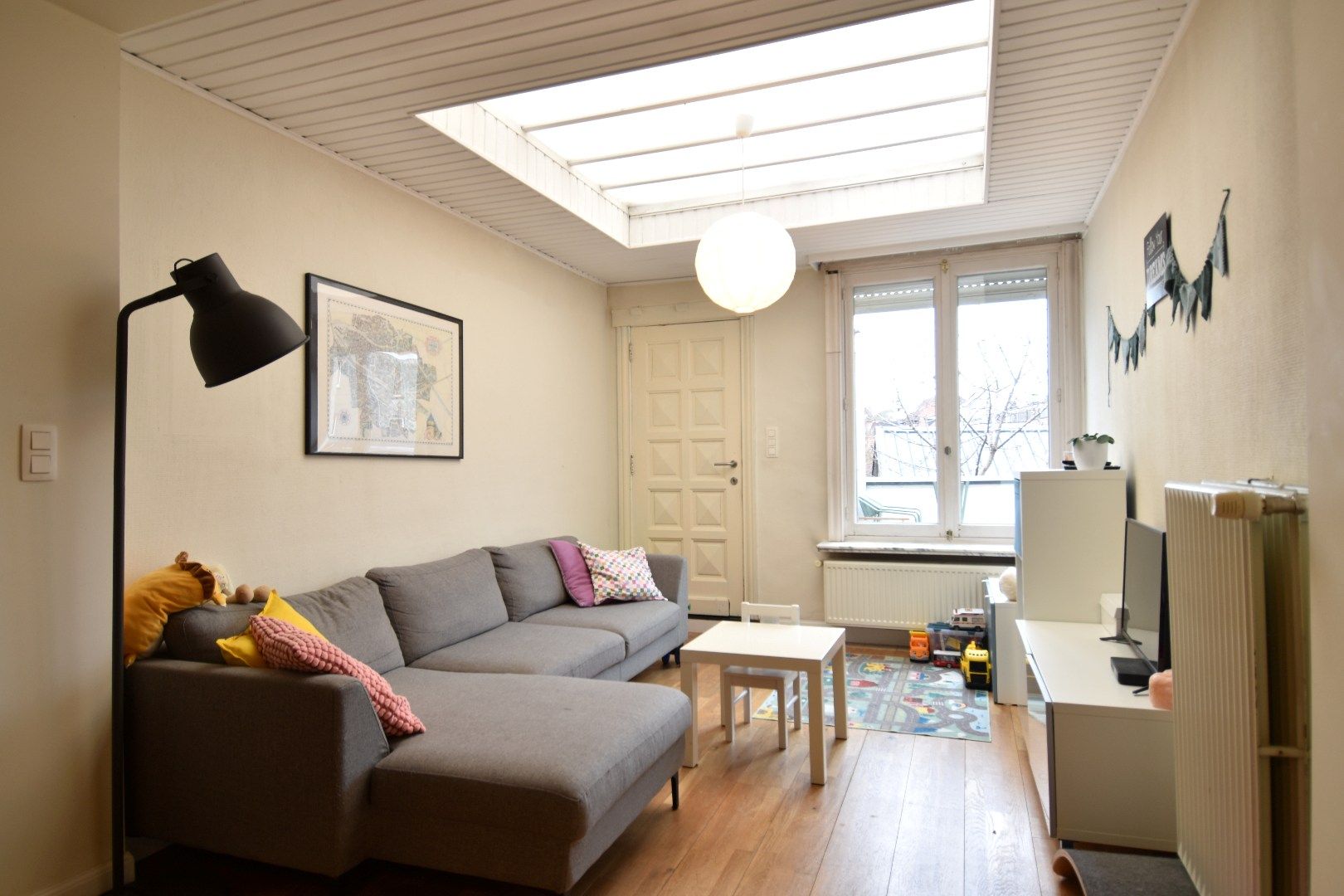 Charmante stadswoning met polyvalente ruimte (48,5 m²) en westgericht terras in hartje Kortrijk foto 3