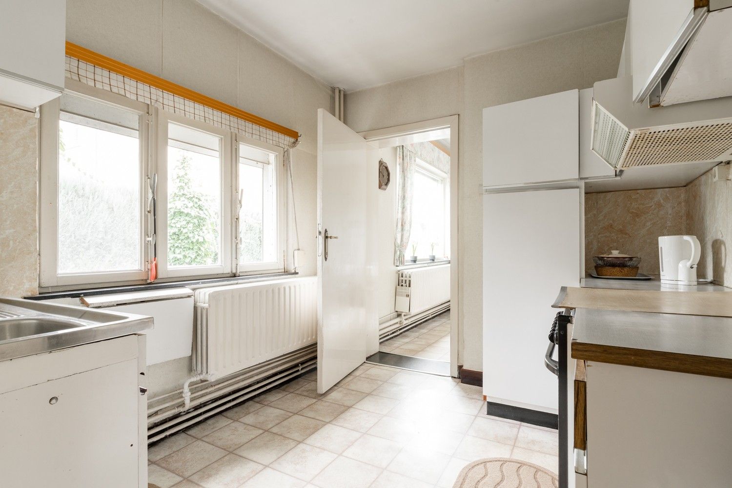 Karaktervolle woning met potentieel op toplocatie in het centrum van Hechtel foto 7