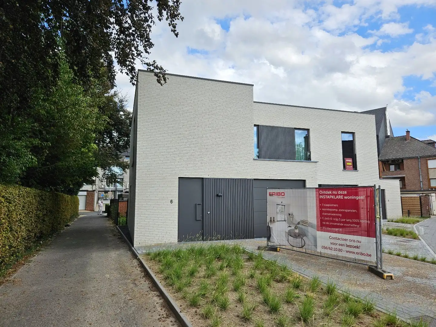 Instapklare nieuwbouwwoningen in hartje Harelbeke foto {{pictureIndex}}